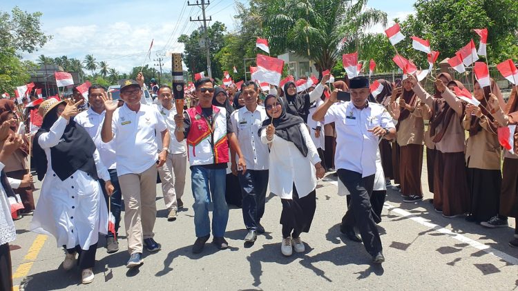 Drumband SMAN 1 Juli Sambut Kirab API PON Aceh – Sumut