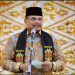 Penjabat Gubernur Aceh, Dr. H. Safrizal ZA, M.Si, Memberi sambutan pada acara Maulid Nabi Besar Muhammad SAW 1446 H, santuni anak yatim sekaligus tepung tawar, di Asrama Merdu dan Meurah Dua Gampong Ateuk, Banda Aceh, Minggu, (13/10/2024)